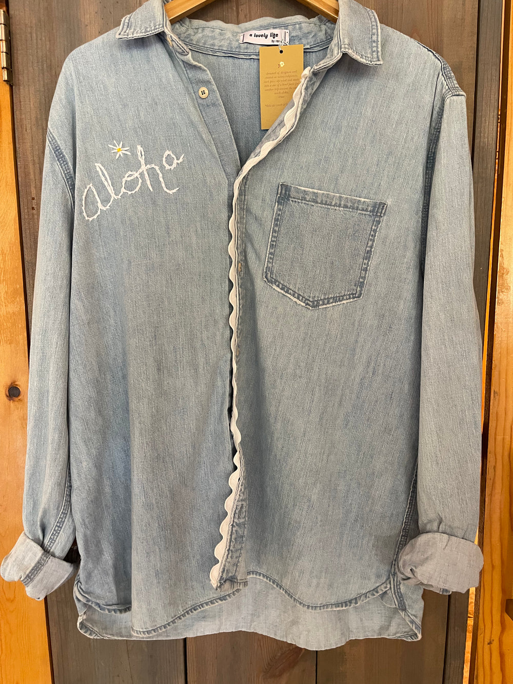 Denim with white ALOHA embroidered on front